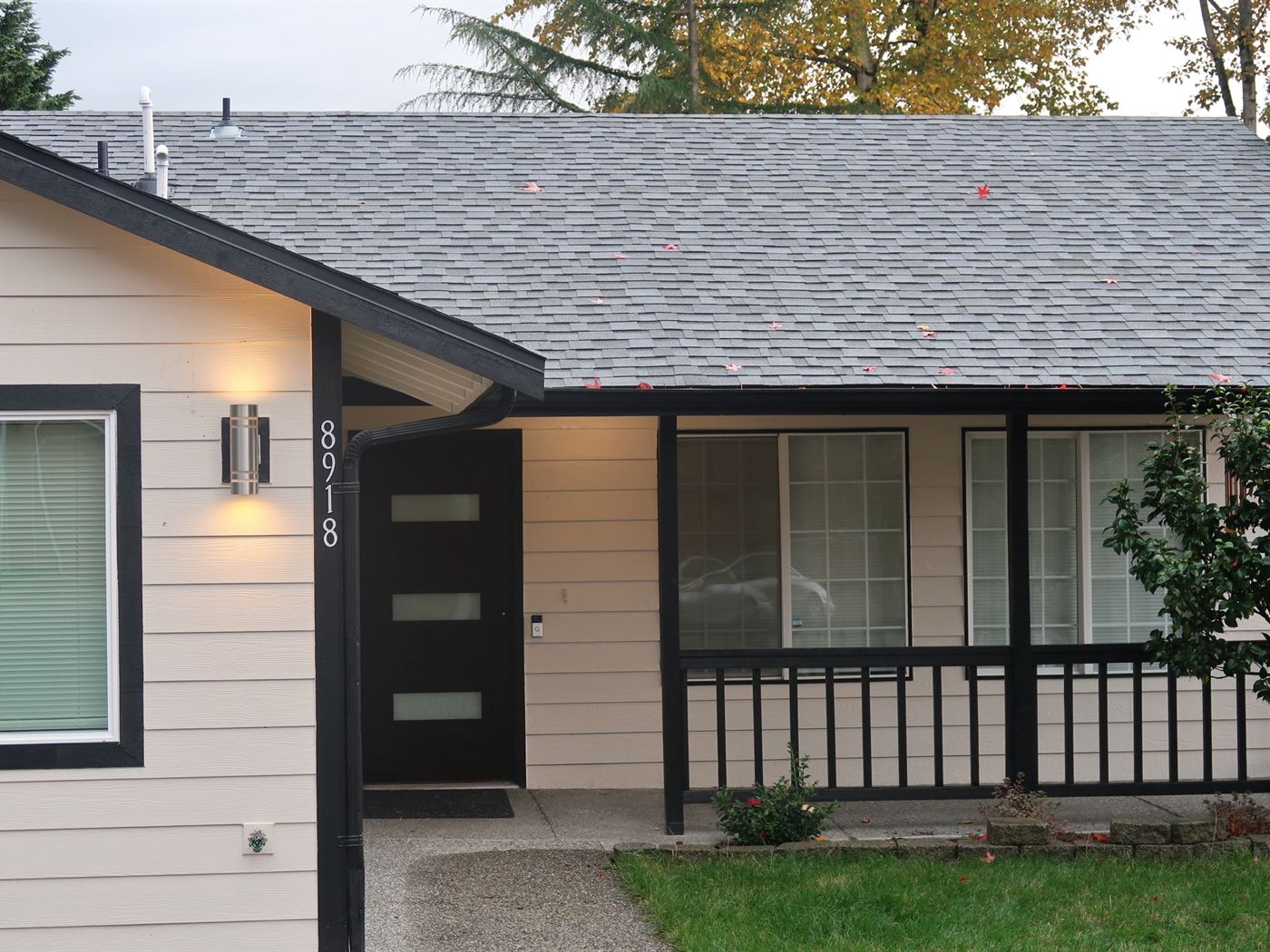The front entrance of Alder House of Comfort, with the covered porch